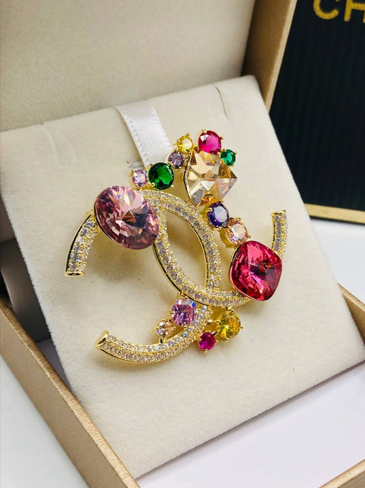 Broche doré CHANEL Colores