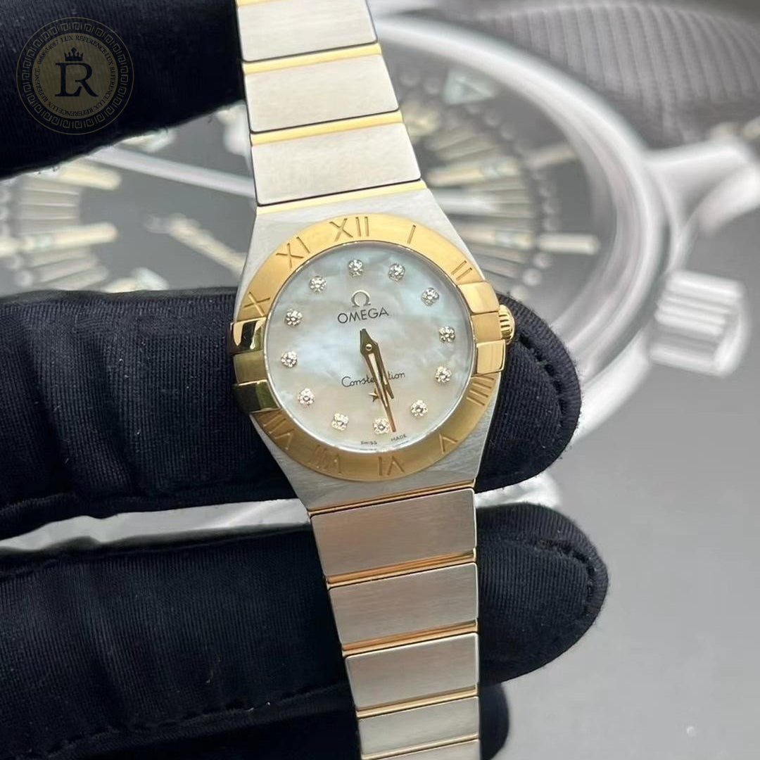 Omega constellation quartz - or jaune