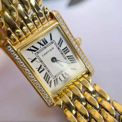 Tank Louis Cartier or jaune - diamants