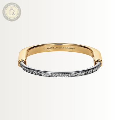 Bracelet Tiffany Lock en or jaune et blanc avec demi-pavé de diamants