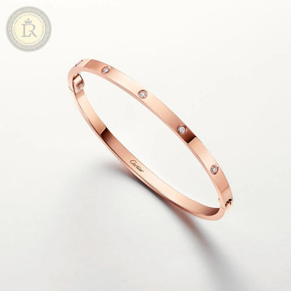 Bracelet Cartier LOVE, petit modele or rose, diamants