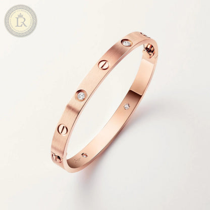 Bracelet Cartier LOVE, or rose, 4 diamants