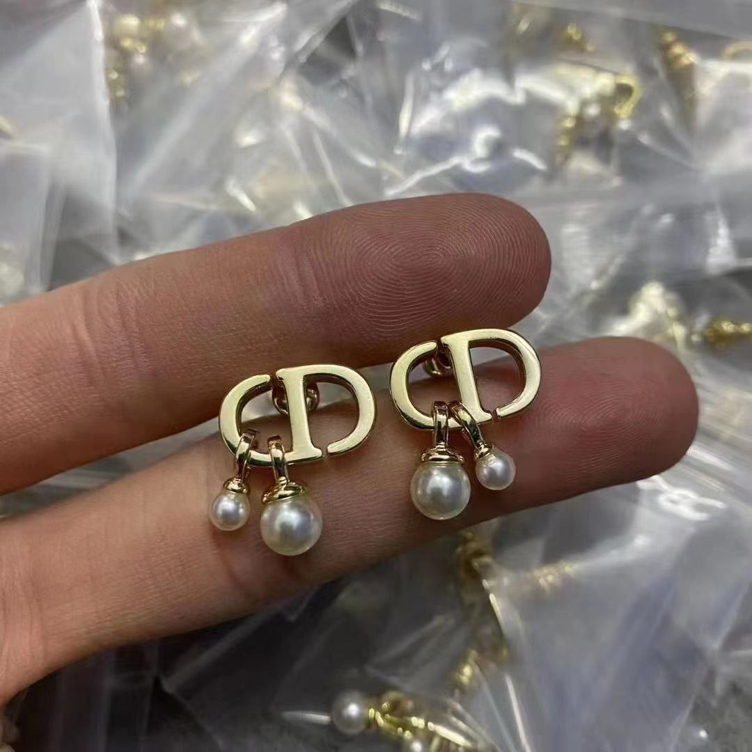 Boucles d'oreilles doré DIOR-CD