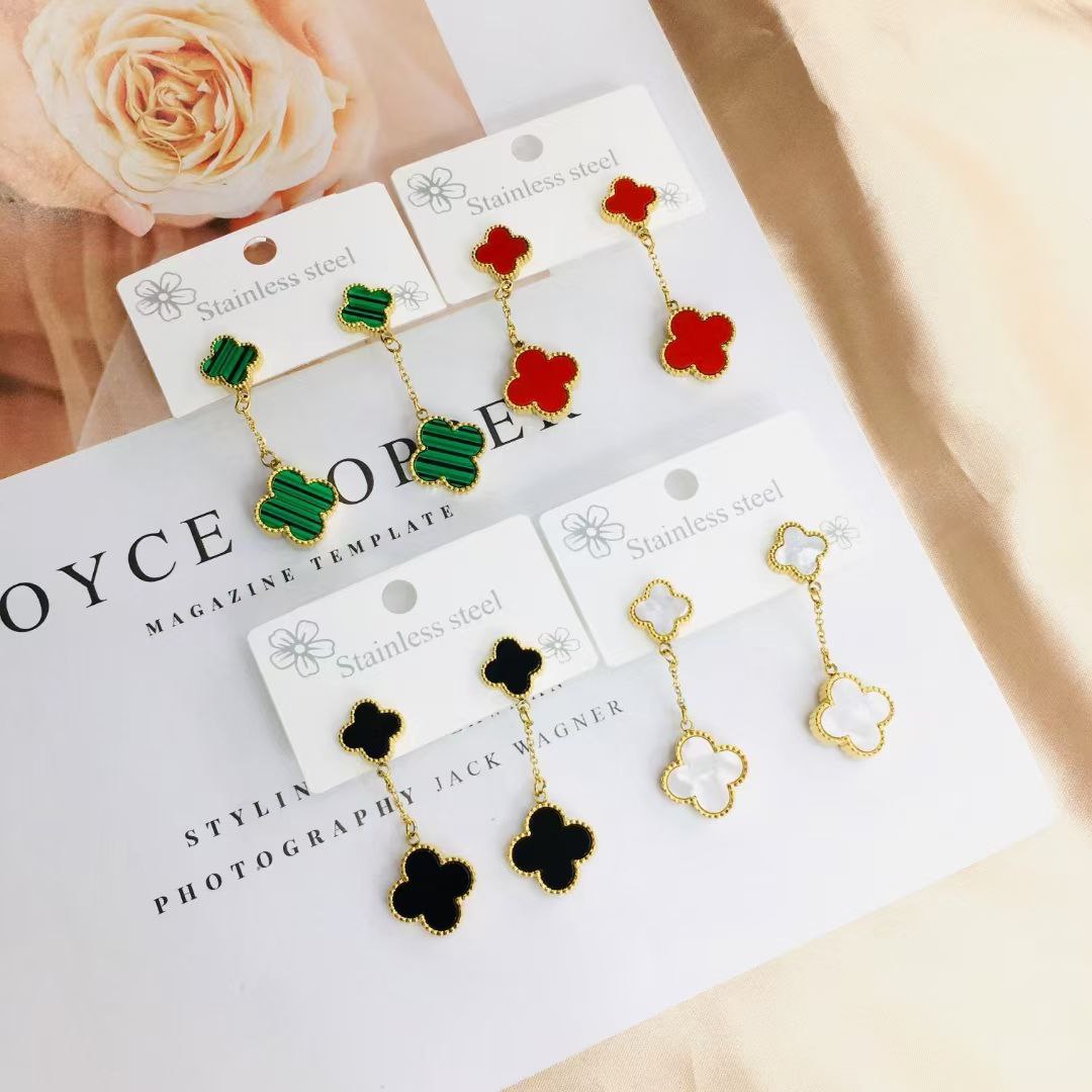 Boucles d'oreilles acier doré Van Cleef double nacre