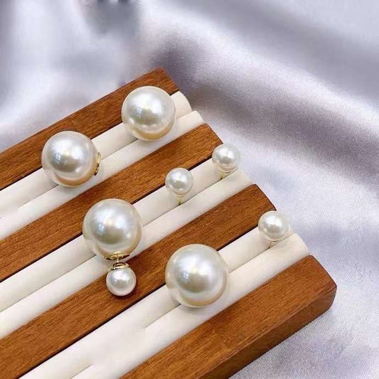 Boucles d'oreilles DIOR double perles