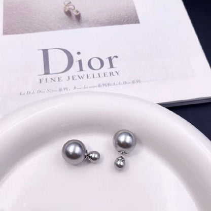 Boucles d'oreilles DIOR double perles