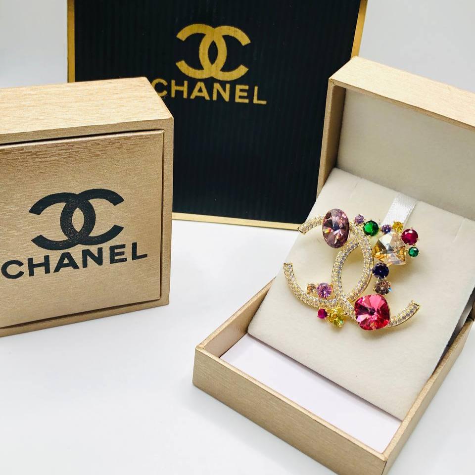Broche doré CHANEL Colores