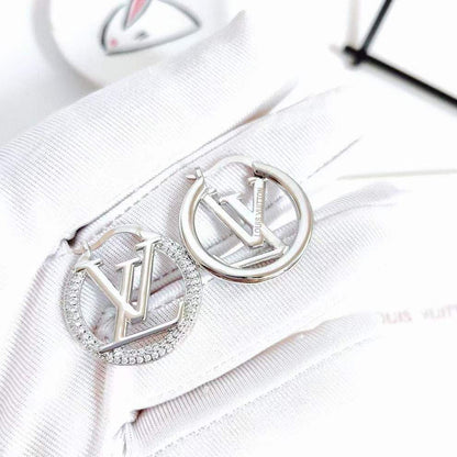 Boucles d'oreilles LOUIS VUITTON strass