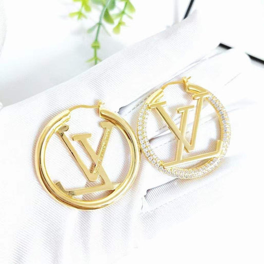 Boucles d'oreilles LOUIS VUITTON strass